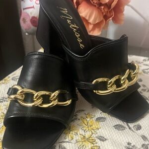 Matisse Black Mules with Gold Chain Accent